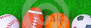 Balls for baseball, american football, basketball, soccer. lie on the green. Outdoor sports championship.