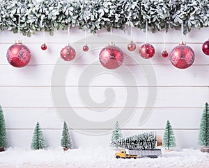 Balls baubles snow of Merry Christmas and Happy New Year decoration for celebration on white wood background with copy space