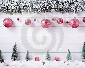 Balls baubles snow of Merry Christmas and Happy New Year decoration for celebration on white wood background with copy space