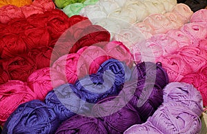 Balls of fabric for sale in haberdashery shop