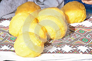 Balls of polenta and cheese in the middle of it, named bulz, a traditional romanian dish