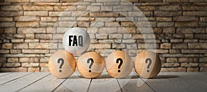 Balls with questionmarks and text FAQ
