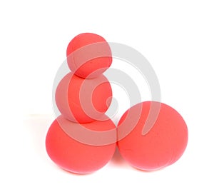 Balls of red modeling clay