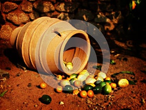 Balls spilling out of old jar