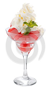 Balls of watermelon in a glass Cremant with whipped cream.