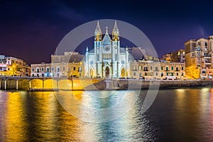Balluta bay, Malta - Panoramic view of the famous Church of Our Lady of Mount Carmel at Balluta bay by night