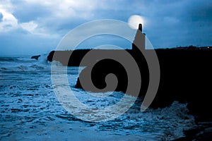 Ballybunion castle and cliffs during storm