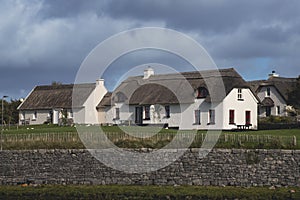 Ballyvaughan, IRELAND - OCTOBER 1, 2022: Beautiful, typical and pretty summer house on the Irish coast