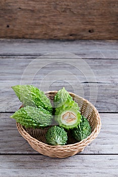 Balsam apple, Balsam pear, Bitter cucumber , Bitter gourd , Stuffed bitter gourd, karela on wood background