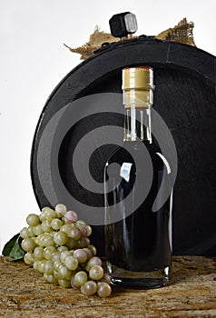 Balsamic vinegar and bunch of grapes