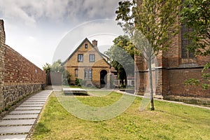 Buildings in the grounds St. Peter`s Church, in German Petrikirche photo