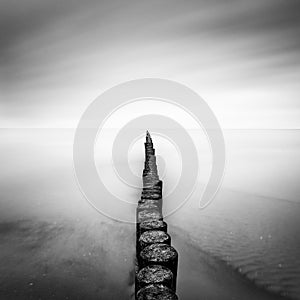 The Baltic Sea coast with pier during rainy day, Usedom, Germany