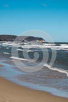 Baltic sea Dark blue clouds and sea or ocean water surface with foam waves before storm, dramatic seascape background