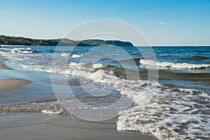 Baltic sea Dark blue clouds and sea or ocean water surface with foam waves before storm, dramatic seascape background