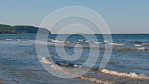 Baltic sea Dark blue clouds and sea or ocean water surface with foam waves before storm, dramatic seascape background