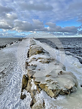 Baltic Sea winter coast beach Daugavgriva pier Latvia