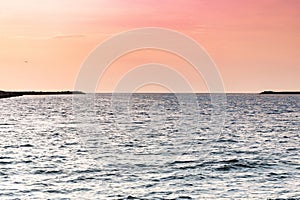 Baltic sunset. Amazing seascape colors. Dreams of travel and freedom. Sundown sky and claim weather