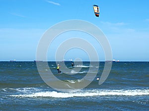 Baltic surfers swimming.