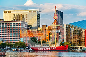 Baltimore, Maryland, US - September 4, 2019 View of Baltimore Harbor with USCG Lightship Chesapeake and office buildings