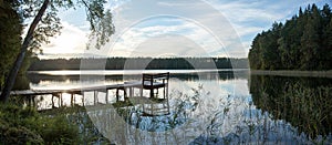 Baltis Lake With A Wooden Pier Sunset Panorama