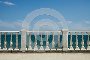 Balustrade on the Black Sea embankment. Beach front of the sea