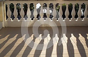 Balustrade casting shadows in sunshine photo