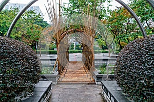 Bamboo arch-shaped pedestrian bridge in Kowloon Park, Hong Kong