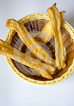 Bamboo basket and fried dough sticks