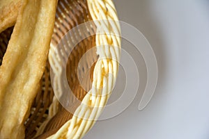 Bamboo basket and fried dough sticks