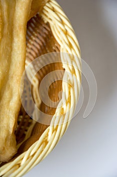 Bamboo basket and fried dough sticks