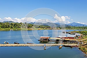 Bamboo bridge and houseboat