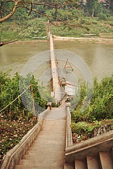 Bamboo bridge for Laotian people and foreign travelers walking travel visit crossing Maenam Khong or mekong river go to small
