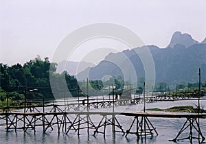 bamboo bridge vang vieng river laos