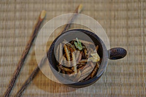 Bamboo Caterpillars in a cup