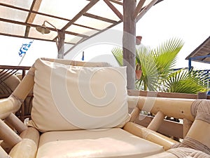 Bamboo chair table in summer day by the beach photo