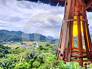 bamboo chandelier on the terrace of the house on the hill