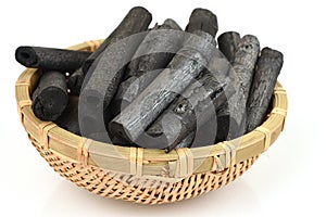 Bamboo charcoal burned in the basket. photo