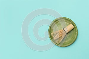 Bamboo chesen on mint color marble background. Japanese tea ceremony concept