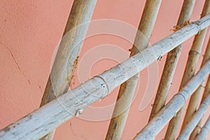 Bamboo fence texture on pink background image