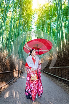 Bamboo Forest. Asian woman wearing japanese traditional kimono at Bamboo Forest in Kyoto, Japan
