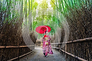 Bamboo Forest. Asian woman wearing japanese traditional kimono at Bamboo Forest in Kyoto, Japan