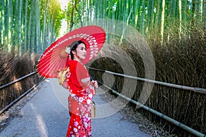 Bamboo Forest. Asian woman wearing japanese traditional kimono at Bamboo Forest in Kyoto, Japan