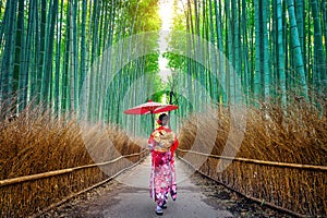 Bamboo Forest. Asian woman wearing japanese traditional kimono at Bamboo Forest in Kyoto, Japan