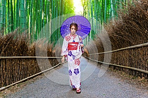 Bamboo Forest. Asian woman wearing japanese traditional kimono at Bamboo Forest in Kyoto, Japan