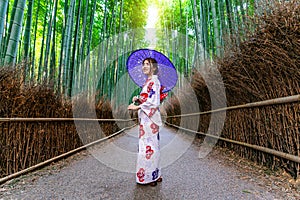 Bamboo Forest. Asian woman wearing japanese traditional kimono at Bamboo Forest in Kyoto, Japan