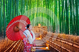 Bamboo Forest. Asian woman wearing japanese traditional kimono at Bamboo Forest in Kyoto, Japan