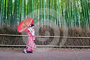 Bamboo Forest. Asian woman wearing japanese traditional kimono at Bamboo Forest in Kyoto, Japan