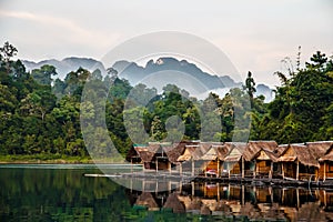 Bamboo huts floating in a Thai village