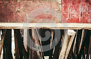 Bamboo logs in support for the freshly laid concrete roof in a under construction building