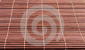Bamboo mat close-up texture backdrop.